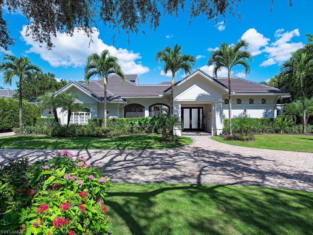Spectacular Fully Furnished Property! gorgeous, newly renovated residence in great location w/beautiful golf & lake views. Overlooking 5th fairway OF THE PINE COURSE, just a short walk to the Club for dining, tennis, & fitness center. Outstanding opportunity to purchase a one of a kind custom home on over .5 acre. Exquisite estate has 4 beds+den 4.5 baths & is thoughtfully designed, providing effortless flow from interior living area to expansive outdoor living space complete w/outdoor kitchen, TV’s, & BAR; perfect for entertaining. Huge backyard features new celebrity greens putting green w/chipping mats for honing your skills. Renovated chef's kitchen features top-of-the-line appliances oversized island, gas cooktop, full sized wine cooler, 2 owner suites, separate guest Cabana & additional family suite. coastal contemporary design/decor w/exquisite finishes & unique architecture can be found throughout. New roof 2021. Grey Oaks Country Club is Naples only private club w/54 holes of WORLD CLASS golf & exclusive amenities including 30,000 SQ FT wellness center, resort style pool, tennis, pickle ball, bocce, restaurants, spa & constant calendar of events for a fantastic lifestyle.