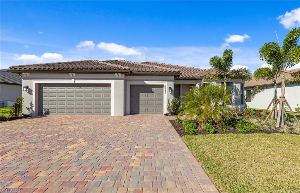 Move in this lovely home now! This home features a 3 Car Garage, Enclosed Flex Room, Large Walk In Shower in Owner's Suite, Sink at Laundry Room, Entertainment Center in Kitchen, Pocket Sliding Door, Walk-In Shower - Bath 2.