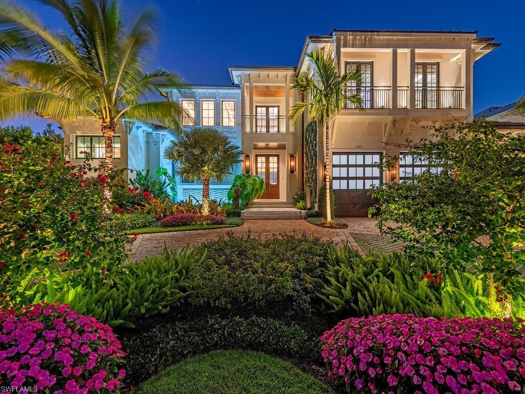 An opportunity previously unseen in Royal Harbor, 2140 Kingfish Road is a breathtaking custom
waterfront estate penned by Jon Kukk and built by Seaside Custom Builders in 2023. A cover feature of
Luxe Interiors + Design Magazine in 2024, this furnished 5-bedroom plus den, 5.5-bathroom home offers
over 6,000 square feet of air conditioned living space, exquisitely decorated by Renee Gaddis. Enjoy
water views from every room, with unobstructed, unmatched sunsets over Naples Bay. The gourmet
kitchen is equipped with top-of-the-line Sub-Zero, Wolf, La Cornue, and Miele appliances. Additional
features include a gas-heated pool with a swim machine, a spa, a private boat dock with two lifts (a
30,000 lb. four-motor beamless high-speed lift and a 10,000 lb. four-motor beamless lift), and seamless
smart home integration. The home is fully zoned for sound with Sonos and prewired for Control4 and
Josh.ai. It also includes whole-house reverse osmosis, a central vacuum system, and Lutron shades for
added convenience. This exceptional residence offers an unparalleled waterfront lifestyle just minutes
from downtown Naples’ world-class shopping, dining, and white sandy beaches.