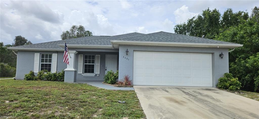 Available for rent in Lehigh Acres! This 3-bedroom plus den, 2-bath home offers a spacious open floor plan with vaulted ceilings and new luxury wood-look vinyl flooring throughout. The den features French doors, making it a great space for a home office, playroom, or extra living area. The home also includes a 2-car garage and a screened-in lanai perfect for enjoying the Florida weather. Located in a private setting with easy access to Fort Myers, shopping, dining, and major roadways. Don't miss this opportunity to rent a well-maintained home in a convenient location.