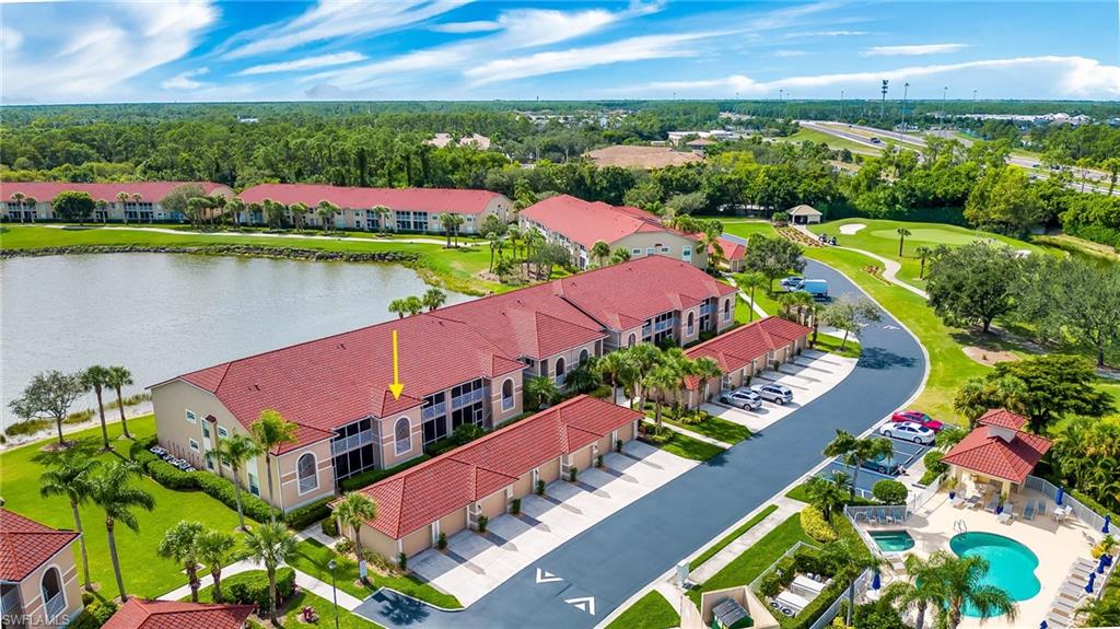 This second floor carriage home has a beautiful long view of the lake and the golf course. This unit has it all, being so close to one of the swimming pools, a one car garage, unlimited golf, and great master amenities. This unit also features a screened-in Lanai on the front of this unit and a screened in patio on the back side which is really nice during the winter months. Cypress Woods is an exceptional community, boasting a private bundled golf membership that grants access to the renowned Gordon Lewis championship golf course. The recently renovated clubhouse offers an array of member activities, ensuring that there's always something to enjoy. delight in the delectable food and beverage offerings available in the Main Dining Room, the ever so popular Grille Room, the inviting Patio, and even poolside service. This vibrant club is known for it's golfing opportunities, the best happy hour in town, member socials, and the latest rage "Pickleball". Indulge in the finest bowl of clam chowder, cold beer, a remarkable golf experience- just living the life! Come and discover the harmonious blend of upscale living and recreational amenities that await you at Cypress Woods Golf & C.C.