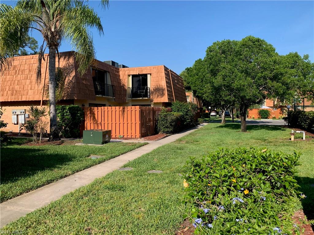 VERY CENTRAL LOCATION in Ft Myers, CLOSE TO EVERYTHING  **  Ready to move in right away   **  This 1260 sf big 2 bed & 2 bath townhouse, located in the great Parkwoods Townhouse Community, is tucked away from street noise  **  Enjoy the privacy of the tropical surrounding of the outdoor living space when sitting on your well sized courtyard  **  The seller spent about $12,000 for the NEW AC on the NEW roof...money you'll save  **  The tiled living & dining room has a lot of entertaining space and the set of 3 large sliders invites the natural light  **  Open them and increase your living space and include the patio and create a bright and big airy living space  **  For romantic evenings or the few cold days in SW Florida.. there is even a fireplace for you  **  Both balconies & bedrooms have been tiled 2 years ago and are generously sized with ample closet space  **  They feature their own balcony overlooking the courtyard  **  2 reserved parking spots for you cars are close by  **  The community pool is not far  **  Parkwoods is really a lovely community in a great central location located between Summerlin Rd. and U.S. 41 with hundreds of shops and restaurants  **  LOW HOA fees!!