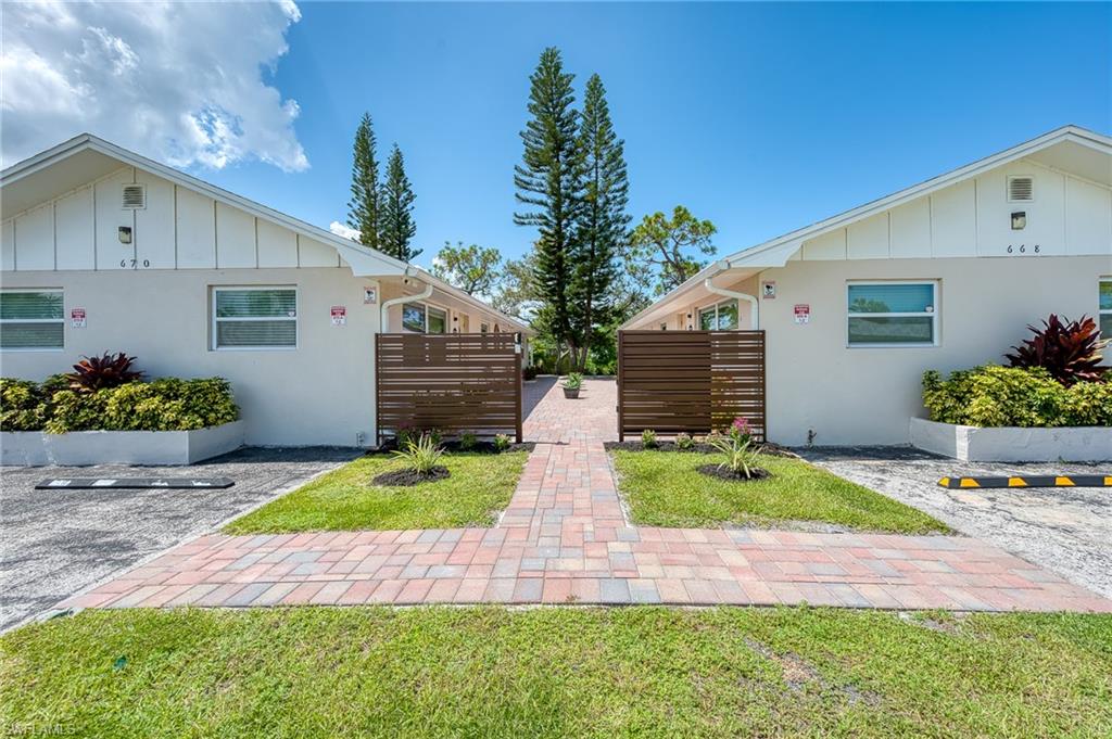 An Exceptional Coastal Investment & Lifestyle Opportunity Perfectly positioned in one of Naples’ most coveted walkable locations. This impeccably renovated dual-duplex property offers effortless access to Vanderbilt Beach and the vibrant Mercato district for world-class shopping, dining, and entertainment. Opportunities like this are rare—and this one delivers, generating over $185,000 in income in 2025. The property features two beautifully updated duplex buildings, totaling four spacious 2-bedroom, 1-bath residences. Each residence is thoughtfully designed for comfort and privacy, offering a private screened lanai with washer and dryer, and patio with BBQ grill, creating an ideal blend of indoor and outdoor living. At the heart of the property lies a lush, fully fenced backyard retreat, ideal for entertaining or relaxing under the Naples sun. Highlights include a covered pergola, fire pit, and generous space to add a custom pool, transforming the grounds into a true resort-style oasis. Ample parking accommodates up to 10 vehicles, a rare convenience in this premier location. A charming, gated courtyard entry, enhanced with security cameras, provides both elegance and peace of mind. Whether envisioned as a luxury income-producing asset, boutique vacation rental, or personal coastal compound, this remarkable property offers the perfect balance of sophistication, location, and lifestyle.