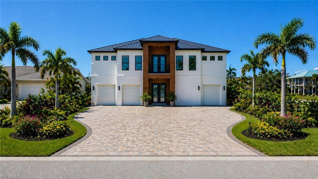 Under Construction | Gulf-Access Luxury | Elevated Coastal Living

Exceptional new-construction 4-bedroom, 3.5-bath luxury pool home offering direct Gulf of America access, new boat dock, and elevated construction built to current Florida Building Code. Designed for modern coastal living, this home features a bright open-concept floor plan with stunning sunset water views throughout.

The chef’s kitchen is a showpiece with high-end appliances, double-stacked cabinetry, a 10-foot statement island, dedicated wine and beverage center, and a walk-in hidden butler’s pantry—perfect for entertaining at a luxury level.

The private primary suite boasts a spa-inspired bathroom and custom his-and-hers walk-in closets. The first floor offers a very large recreation room which offers flexible living space, while the enormous garage provides exceptional room for vehicles, storage, and water toys and golf carts.

Resort-style outdoor living includes a luxury pool, seamless indoor-outdoor flow, and quick boating access to open water. There's a private boat ramp and a community park with outdoor gills etc. This house has gorgeous views. Centrally located near upscale shopping, dining, and entertainment, this home delivers the best of Southwest Florida waterfront living. Estimated completion date end of June.