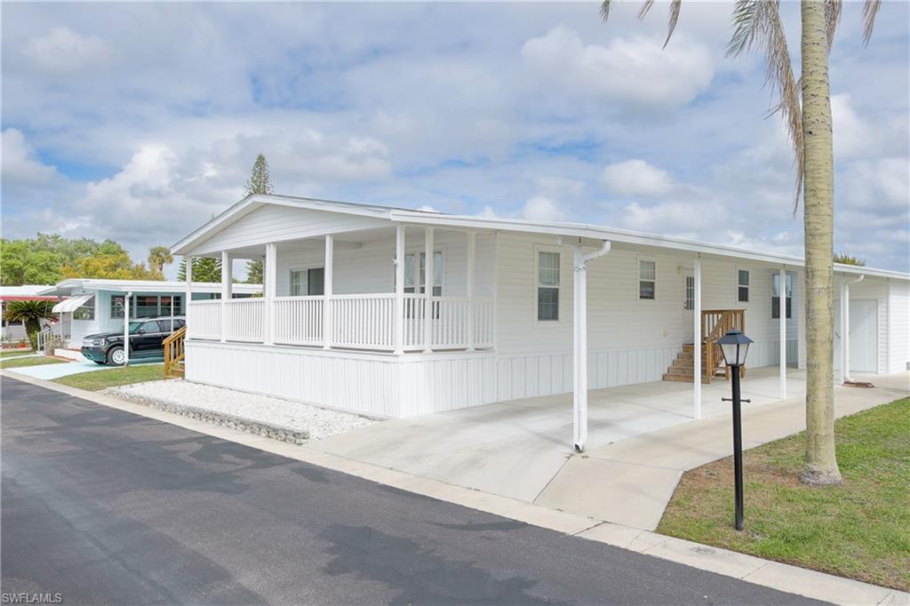 Welcome to Oak Park Village—a highly desirable, resident-owned 55+ riverfront community tucked away in the heart of Alva along the peaceful Caloosahatchee River, offering convenient access to the Gulf. Ideal for those seeking a relaxed, boating lifestyle, this vibrant community features exceptional amenities and a welcoming atmosphere. Residents enjoy low monthly HOA fees that cover essential services including lawn care, water, sewer, and access to a community pool, fitness center, clubhouse, library, and boat launch. Oak Park Village strikes the perfect balance between tranquility and an active social lifestyle.  If you're ready to embrace the beauty of riverfront living, this beautifully decorated, fully furnished 2018 manufactured home is a must-see. Offering 3 bedrooms and 2 bathrooms, the home features a spacious open-concept layout connecting the kitchen, dining, and great room areas. Sliding glass doors lead to a large, covered front porch that spans the entire width of the home—perfect for relaxing or entertaining.  The kitchen is thoughtfully designed with white GE appliances, including a two-door refrigerator with bottom freezer, electric range with self-cleaning oven and overhead microwave, and dishwasher. Additional highlights include under-cabinet lighting, a large walk-in pantry, and a center island with built-in wine rack and bar seating.  The primary suite offers a walk-in closet and an oversized bathroom complete with dual sinks, abundant cabinetry, a garden tub, and a separate shower. The guest bedrooms are comfortably sized, making them ideal for visitors or a home office.  Additional features include an indoor washer and dryer, a large storage shed, and a covered carport with a dedicated path for the included golf cart. Conveniently located near the post office, shopping, and dining, the community also offers a weekly shuttle service for groceries and scheduled activities.  Optional extra storage is available for just $20 per month for your boat, trailer or RV (first-come, first-served), there is also boat dock space available for lease in it's private marina and a community heliport provides added peace of mind for emergency access and a community bus for outings and shopping trips.

Come experience the charm and convenience of waterfront retirement living in Alva—schedule your private showing today!