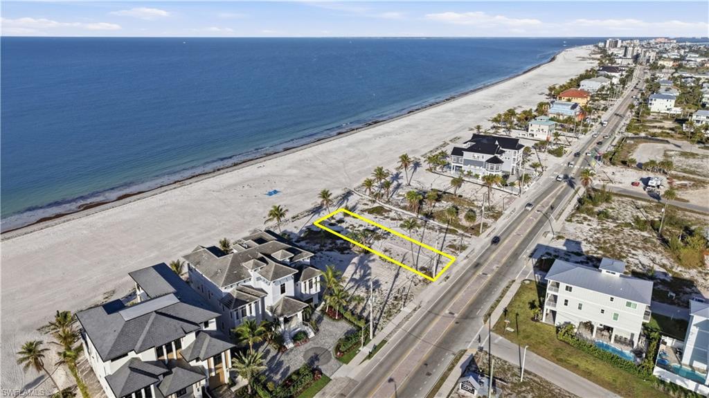 Gulf-Front Lot on Fort Myers Beach | Build Your ELEVATED Custom Beachfront Home. Exceptional Gulf-front homesite on Fort Myers Beach offering direct beach access, panoramic Gulf of Mexico views, and stunning sunset vistas. This beachfront lot (50’ x 140’ ±) provides a rare opportunity to build a custom coastal luxury home in one of Southwest Florida’s most desirable beachfront locations. Walking distance to Margaritaville, the Pier District, Bars & Restaurants. The generous lot dimensions allow ample space to design a spacious Gulf-front residence with expansive outdoor living areas, elevated decks, and large windows to capture breathtaking water views and nightly sunsets over the Gulf. Whether you're planning a private beachfront retreat, luxury vacation home, or investment property, this property offers the perfect foundation for your vision.
An adjacent parcel may also be available for purchase, creating the opportunity for a larger estate-sized beachfront property or expanded building footprint.
Located on Fort Myers Beach, known for its white sand beaches, boating, waterfront dining, and vibrant coastal lifestyle, this property combines prime Gulf-front location with endless custom building possibilities.
Builder referrals available for buyers exploring architectural and construction options.