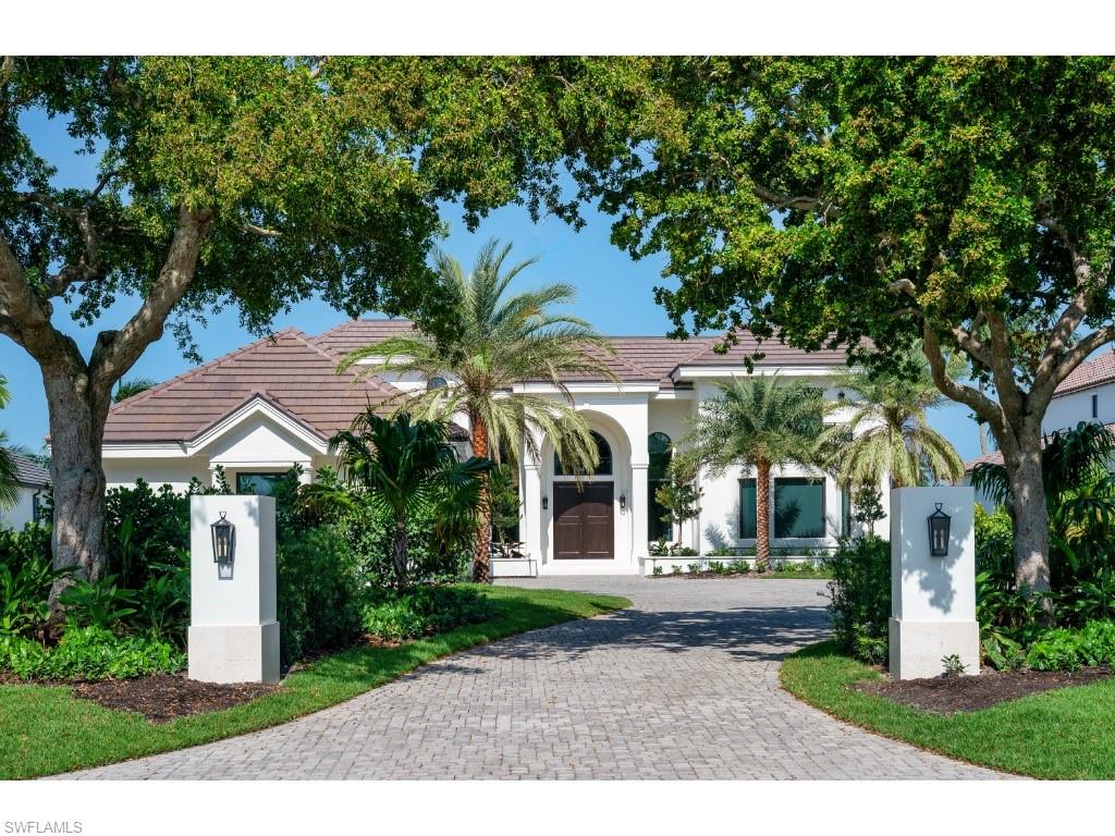 This well configured home with sought after western exposure overlooking the wide waters of Smuggler’s Bay has just been remarkably renovated to meet the needs of today’s discerning buyers! The dramatic approach under mature shade trees and along the lushly landscaped gardens opens to a spacious motor court and the beautifully enhanced residence. The home features four well-sized bedrooms, an office, and a den providing abundant space for family, guests, and work-from-home needs. The formal spaces include a voluminous, light-filled living room and a separate dining room, perfect for entertaining. The kitchen seamlessly flows into the family room area with large windows and wide open views of the serene waterway beyond. An expansive pool deck and terraces provide abundant space for outdoor gatherings with family and friends. Recent improvements too numerous to list! Three garage bays. A harmonious blend of elegance and modern comfort nestled in the exclusive Port Royal neighborhood of Naples, Florida! Port Royal Club membership eligibility.
