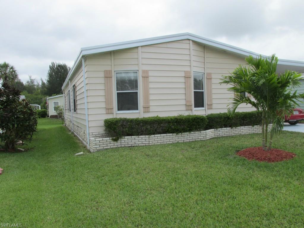 This two bedroom, two bath home is located in beautiful Lee Plantation, a gated community nestled in between Sanibel and Ft Myers Beach. This home has all new laminate flooring, new air conditioning, new lanai windows, and is sparkling clean. All rooms are spacious and airy. The dining room has a built in hutch, the kitchen is large and open, and the bedrooms are split at opposite ends of the house. Lee Plantation has it all- Pool, spa, tennis, shuffleboard, patio, exercise room, library, card room, and community kitchen.