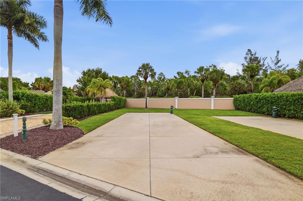 Exceptional opportunity to own a luxury Class A motorcoach lot in Naples Motorcoach Resort, one of Southwest Florida’s most sought-after gated RV communities. Lot 58 offers the perfect setting to create a private outdoor oasis with custom pavers, tropical landscaping, a tiki hut, cabana, outdoor kitchen, or other approved enhancements designed around your ideal luxury RV lifestyle. The lot placement backing up to the community privacy wall provides additional privacy.  What makes this property truly special is the rare opportunity to purchase the adjacent Lot 57, also available from the same owner. Combine both lots to create an expansive luxury motorcoach estate with additional privacy, entertaining space, and endless possibilities for a one-of-a-kind Florida retreat. Naples Motorcoach Resort delivers a resort-style lifestyle with three pools, including a spectacular infinity-edge pool, relaxing spas, sauna, fitness center, pickleball courts, clubhouse events, dog park, and community boat ramp with access to scenic waterways. Ideally situated between the pristine beaches, boating, and dining of Marco Island and the upscale shopping, fine dining, and entertainment of downtown Naples. Whether you are searching for a seasonal Florida residence, a luxury RV lot, or a unique opportunity to build a custom motorcoach compound, Lot 58 provides the location, flexibility, and lifestyle that make Naples Motorcoach Resort one of Florida’s premier Class A motorcoach destinations.
