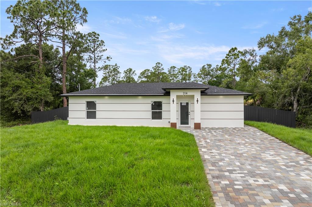 Brand-new construction featuring 3 bedrooms and 2 bathrooms, fenced and a covered patio with beautiful finishes throughout. This move-in ready home offers stainless steel appliances, modern design, and sits on a spacious quarter-acre lot. Perfect opportunity for a new owner looking for comfort and style. Conveniently located near shopping, restaurants, SR-82, major highways, and Southwest Florida International Airport, providing easy access to Fort Myers and surrounding areas. Do not miss this rare opportunity and call today for a private showing.