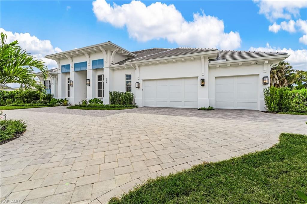 Experience luxury living in this brand-new, fully furnished home in the desirable Big Cypress Golf & Country Club — a centrally located, rapidly growing neighborhood in the heart of Naples. Built by Borelli Construction of Naples, a respected third-generation family builder, and designed and furnished by Studio Sea Bee, this residence offers timeless style and modern comfort with sweeping western golf course views and sunsets that fill the home with golden light. The thoughtful floor plan features four private en-suite bedrooms, each positioned for comfort and privacy, plus a three-car garage. The open great room design is ideal for entertaining, with a wet bar, large walk-in pantry, and dining area that flows seamlessly to the expansive covered lanai equipped with electric screens and hurricane shutters. Outside, enjoy a 45-foot heated pool with sun shelf and spa, perfectly oriented for afternoon sun and glowing evening skies. The primary suite showcases serene golf course views, dual custom closets, and a luxurious spa-like bath. Throughout the home, every detail has been meticulously crafted — white oak flooring, LED recessed lighting, designer fixtures, Wolf and Sub-Zero appliances, custom trim and millwork, and built-in Sonos speakers for whole-home sound. Additional features include a whole-house generator with a 1,000-gallon underground propane tank, hardwired automated window shades, and custom closet systems throughout. Enjoy modern luxury and relaxed golf course living in one of Naples’ most convenient locations — just minutes from beaches, dining, and shopping.