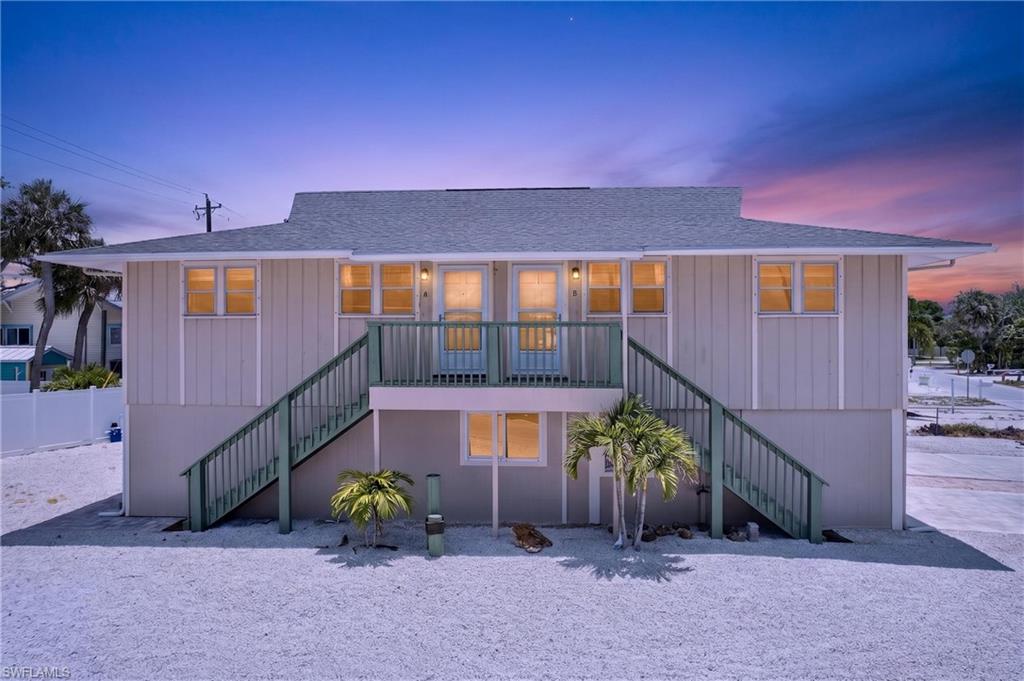 Eucalyptus Park: Premier Duplex with lower owner’s unit in Weekly Rental District!!!

Incredible investment opportunity at 3188 Shell Mound Blvd, perfectly situated on an oversized corner lot in the highly lucrative Fort Myers Beach Weekly Rental District. This versatile property is a short-term rental (STR) powerhouse, located just one block from the white sugary sands – only 800 feet to the Beach with Room for a Pool! and steps away from the island's vibrant dining, local attractions, and rich history.

The ground floor features a spacious Owner's Suite offering 2 bedrooms and 2 bathrooms, providing the perfect private beachside retreat, on-site manager's quarters, or premium rental unit. Above, the upper duplex consists of two separately metered income generators: Unit A (2 Bed / 1 Bath) and Unit B (2 Bed / 1 Bath). Both upper units are ready for immediate rental. The lower unit is being updated and beautifully renovated with contemporary coastal finishes, modern flooring, and stylish fixtures designed to capture maximum booking rates.

Unwind and enjoy breathtaking Southwest Florida sunsets right from your property. The expansive corner lot footprint offers ample room to add a custom resort-style pool, a high-demand amenity that will instantly skyrocket your nightly rates and occupancy. Whether you want to live downstairs and let the upper duplex pay your mortgage, or rent all three units for maximum cash flow, this turnkey beachside multi-family property is primed for immediate success in the newly revitalized Fort Myers Beach paradise!!