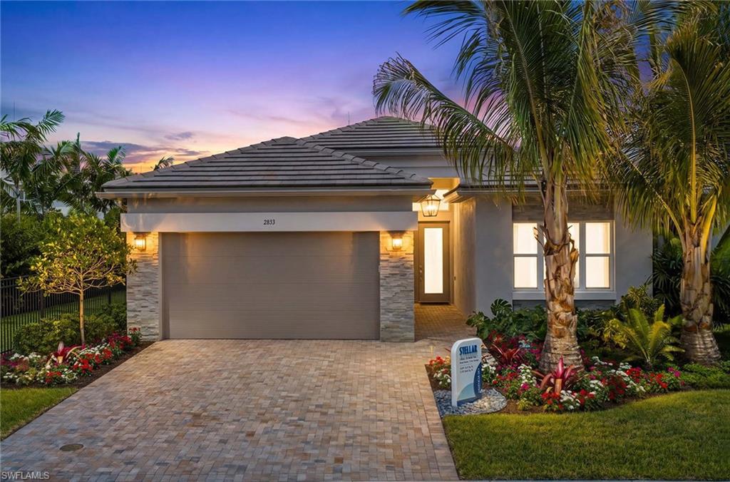 Experience the best of luxury living in this brand-new single-family home in Valencia Sky, ready for move-in in August 2026. The highly acclaimed newly-designed "Stellar" floorplan offers 2 bedrooms plus a den, 2.5 bathrooms, 2,079 square feet, soaring 12-foot ceilings, transom windows, upgraded tile throughout, designer paint, and a gourmet kitchen with quartz counters, full backsplash, GE Profile appliances, vented hood, and pantry cabinets. Relax on the private screened lanai overlooking landscaped views, already pre-plumbed for a future summer kitchen. Located in a natural gas community, Valencia Sky offers active adult luxury living with a spectacular 35,000-square-foot clubhouse and resort-inspired amenities, including restaurant and bar, social hall with pre-function lounge and stage, fitness center, shaded yoga garden, steam room, full service spa & salon, salt therapy area, cold plunge, cooking studio, arts and crafts studio, resort-style pools, lap pool, resistance pool, tennis, 9 pickleball courts, bocce, dog parks and more! Conveniently located near downtown Naples, with premier shopping, dining, entertainment, and Gulf beaches.
