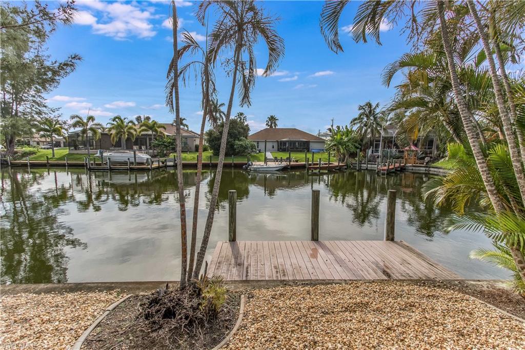 SW Cape Coral GULF ACCESS  3 Bedroom 3 Bathroom 3 car garage Heated Pool Home (Sands & beach neighborhood).  This open floor plan with elevated ceilings offers over 2500 square feet of living area plus two MASTER SUITES!. This meticulously maintained Eastern exposure home features beautiful water views, private dock, and a spacious lanai to enjoy the Florida Sunshine. Updates galore, New Roof, Pool Pump/Heater, A/C, Home security, Electric panel, and Kitchen Appliances.  Grab this Amazing home with boating access to the Gulf of Mexico, beaches, and surrounding islands such as Cayo Costa, Cabbage Key, Sanibel, Boca Grand,etc. THIS HOME IS PRICED TO SELL!