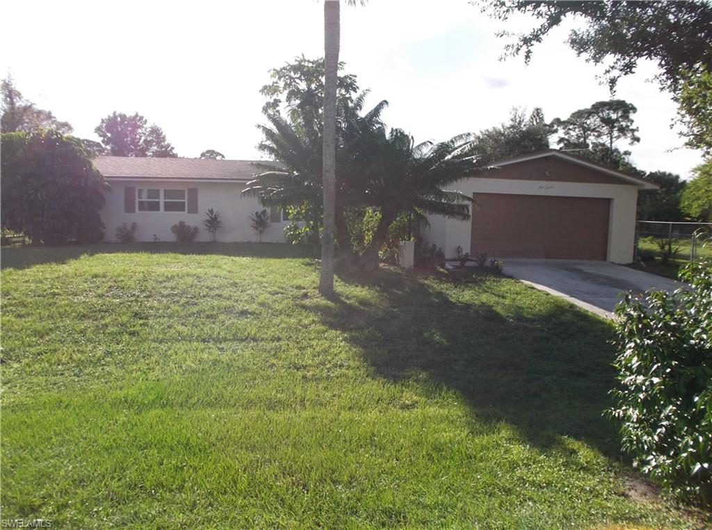 Feel safe, secure, and have peace of mind in this home equipped with heavy duty impact windows and doors. Did you know having this feature may also reduce your A/C bills? With in walking distance to schools, parks and stores. Some features of this home are three oversized bedrooms, tile through out, very large screened in lanai, city water, fenced in yard with fruit trees, half court basketball and much more. All this in a very nice and quiet area of Lehigh.