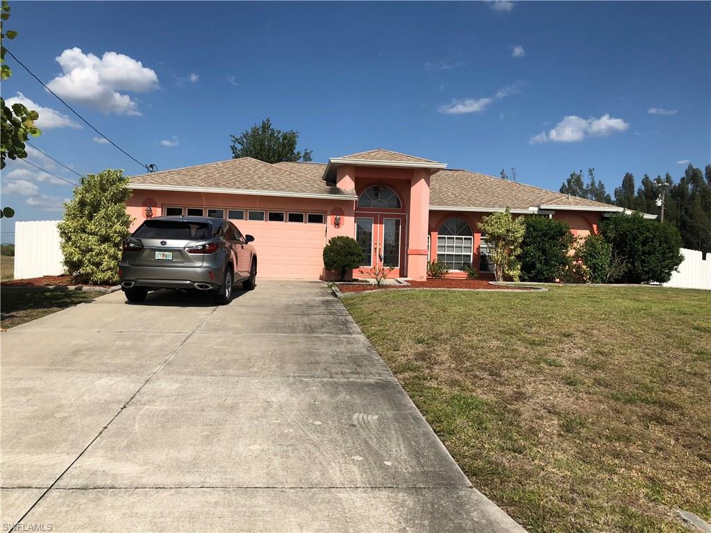 This lovely turnkey home is located in a very quiet yet very convenient area.  Close to Pine Island Road, shopping and restaurant,  library and schools. This three bedroom home features a great room floor plan with split bedrooms. The great room features high ceilings. Outdoors there is a nice lanai and a screened very large solar heated pool all surrounded by a white aluminum fence for privacy. There is an indoor utility room and plenty of storage. This is a great place to call home. Come and see for yourself. Easy to show at any time.