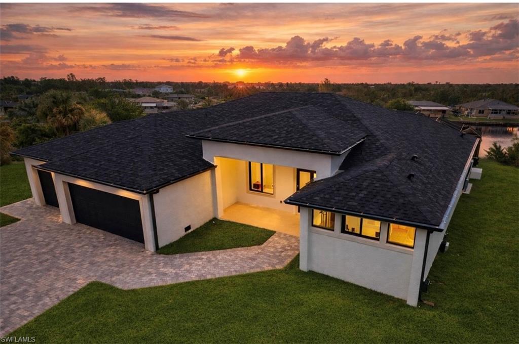 An exceptional waterfront residence where elegance, comfort, and lifestyle unite. 15048 hennipen Cir. Port Charlotte FL.



Welcome to this stunning brand-new 2025 home located in the highly desirable SW Port Charlotte, where year-round sunshine, glowing sunsets, and tranquil surroundings define everyday living.



Thoughtfully positioned just minutes from prestigious golf courses, this residence offers an elevated lifestyle for those who appreciate refinement and nature in perfect harmony. Its navigable canal provides direct access for boating, fishing, or leisurely cruises—bringing the true Florida waterfront experience right to your backyard.



The home features 3 generously sized bedrooms, 1 private office (den), and 3 beautifully designed full bathrooms, all showcasing modern finishes, elegant closets, and timeless design.

The kitchen is a true masterpiece—a sophisticated and functional space with high-end finishes, exceptional lighting, and a striking modern pantry with custom shelving and drawers, ideal for both daily living and entertaining.



Every detail has been carefully curated, from the perfectly balanced lighting that enhances each space to the seamless indoor-outdoor flow. Step outside to your private oasis featuring a resort-style pool overlooking the canal, an inviting outdoor grilling area, and a dedicated refrigerator for cocktails and beverages, designed for unforgettable gatherings. The property also includes three garages, offering ample space and everyday convenience.



This home is especially ideal for buyers relocating from colder states who desire a luxurious second home in a warm, vibrant setting. Florida stands as the ultimate destination, and SW Port Charlotte offers an exceptional advantage with lower taxes, a relaxed yet refined atmosphere, and a lifestyle that is both sophisticated and effortlessly enjoyable.



Renowned for its peace, natural beauty, and growing vibrancy, Port Charlotte continues to evolve with exciting new developments, including the renowned Sunseeker Resort, a premier waterfront destination that has elevated the area’s appeal and lifestyle.



?? More than a home—it is an invitation to live beautifully.