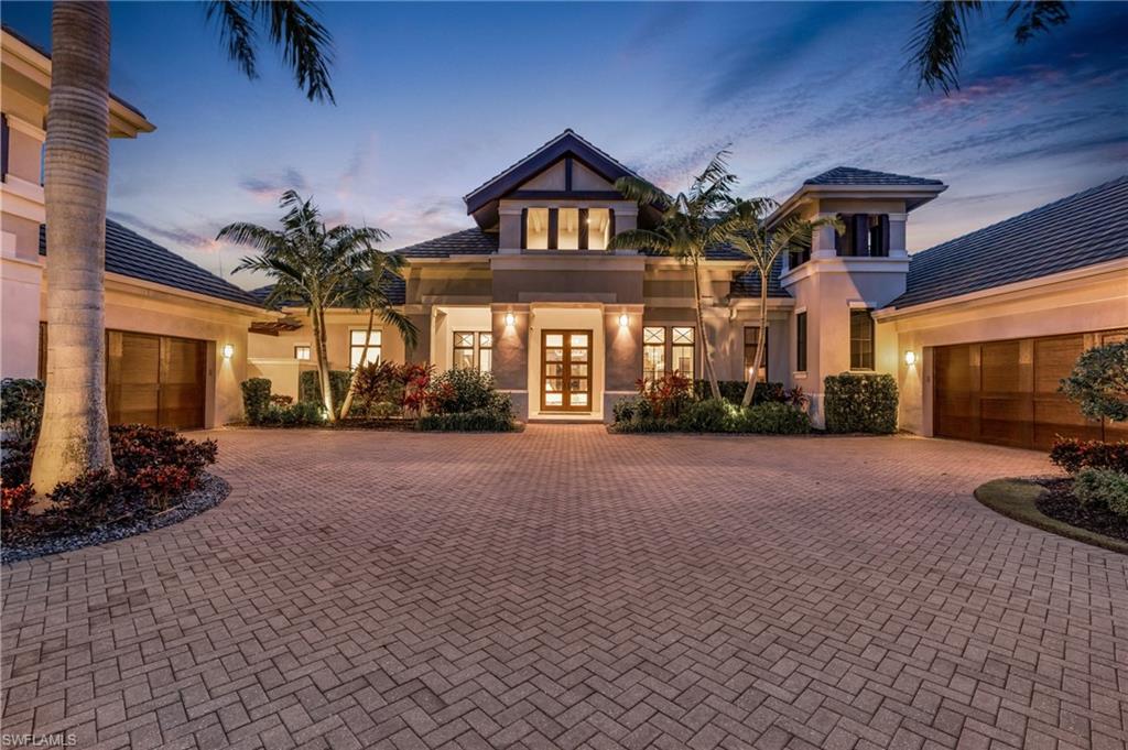 THE BEST LOCATION, VAST PRICE REDUCTION + FULLY FURNISHED.. this dynamic entertainers delight is perfectly set on the widest portion of the lake with western exposure nestled within Naples' esteemed golf enclave of Quail West.This home boasts four bedrooms, 4 1/2 baths, and a plethora of lavish amenities that redefine contemporary sophistication.Positioned on an expansive lot overlooking the largest section of the lake, with an elevation 16 feet above base flood elevation, this residence offers unparalleled privacy and stunning lake views from most of the generously proportioned interior spaces and perfect lanai. Seamlessly blending indoor and outdoor living, all integrated with Control4 smart home technology for ultimate convenience and security with lighting control and whole-home distributed audio system providing modern comfort at your fingertips.The exterior impresses with its architectural details and paver driveway leading into the dual, air-conditioned 2 car garages with ample space for 4 cars+ 2 golf carts. Undoubtedly one of the best locations within Quail West.Step inside to discover a sanctuary of comfort and style. The open floor plan seamlessly connects the living spaces, including the living room, family room, dining room, and study, ideal for intimate gatherings or grand entertaining. Craftsmanship abounds, with intricate beamed ceiling details, wood, stone, and tile accents exuding luxury in every corner. The gourmet kitchen is a culinary enthusiast's delight, featuring custom Omega cabinetry, quartz countertops, and top-of-the-line Wolf and Sub-Zero appliances. A charming breakfast nook with tongue-and-groove ceiling detail offers a relaxed dining experience. Retreat to the master suite overlooking the pool and lake, featuring a spa-like bathroom with a walk-in shower leading to an exterior shower, a freestanding tub, and a master suite wet bar. Custom closet systems provide ample storage, while ceiling details elevate the bedroom's elegance. Each bedroom boasts an en suite bathroom for ultimate privacy.Outside, the lanai and pool area epitomize relaxation and sophistication, surrounded by lush landscaping and mosquito mist system. The inviting pool features a raised spa, sun shelf with lighted bubblers, and fire bowls, while travertine flooring and ceiling beam detail add a luxurious feel to every aspect.The outdoor kitchen, complete with ample cabinetry, granite tops, and Alfresco gas grill, is perfect for al fresco dining. True western exposure makes this property a paradise for breathtaking sunsets over the shimmering lake. Quail West offers an array of amenities, including 36 holes of golf, a Grand Clubhouse, dining venues, a spa, fitness center, tennis courts, and more. With its impeccable craftsmanship, luxurious amenities, and panoramic views, this home exemplifies refined living in Naples' premier community.Experience the pinnacle of luxury living, where every detail is meticulously curated for the discerning homeowner.
