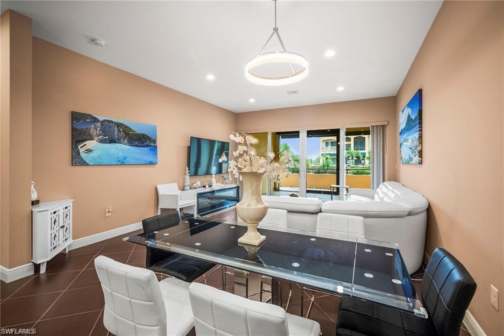 Experience the comfort and convenience of luxury condominium living in Genova, one of Estero's most distinctive communities. Unlike many newer developments, this residence offers superior construction quality, exceptional privacy, and a rare oversized private 2-car garage featuring an 18-foot-wide door.

Inside, you'll find an open-concept floor plan with 10-foot ceilings, abundant natural light, and stylish finishes throughout. The kitchen is designed for both everyday living and entertaining, featuring white cabinetry, light granite countertops, a large center island with ample seating, stainless wall oven and microwave, electric cooktop, and a contemporary stainless vent hood. The kitchen flows seamlessly into the spacious great room and dining area, creating an inviting space to relax or gather with friends and family.

The primary suite offers a private retreat with direct access to an open courtyard-level lanai. The spa-inspired primary bath features a freestanding soaking tub, a spacious walk-in shower with tile extending to the ceiling, dual vanities, and generous storage with both a walk-in closet and an additional bypass closet.

A split-bedroom layout provides excellent privacy, with the guest bedroom and bath situated on the opposite side of the residence. A versatile den with glass French doors can serve as a home office, study, or third bedroom. Additional conveniences include a dedicated laundry room with utility sink and multiple outdoor living spaces, including a screened lanai overlooking the beautifully landscaped courtyard.

Built with quality in mind, the residence features impact-resistant windows and doors, solid-core composite interior doors, full batt insulation within interior walls for enhanced sound reduction, and construction details that create the feel of a single-family home rather than a condominium.

Enjoy a low-maintenance lifestyle in a prime location close to shopping, dining, entertainment, and Southwest Florida's beautiful Gulf beaches. Available for annual lease.