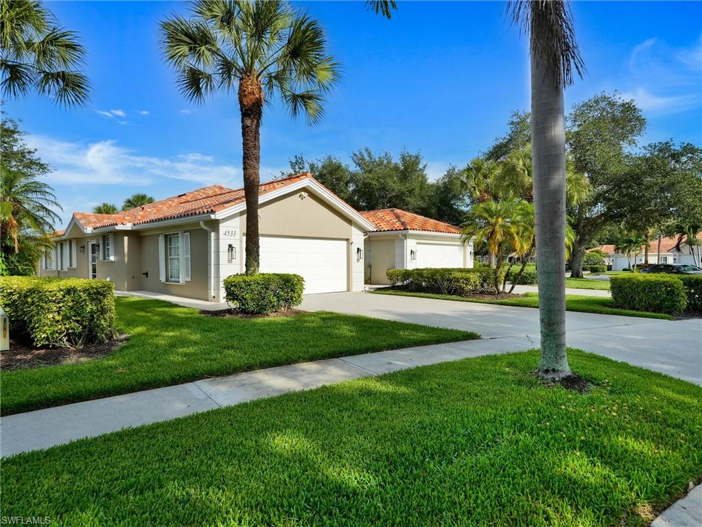 Beautifully updated Capri Villa in desirable Village Walk! This exceptional 2-bedroom + open den, 2-bath villa is a standout example of Capri living and is truly move-in ready. Meticulously maintained and impeccably clean, this home offers numerous upgrades and improvements throughout. Features include consistent luxury vinyl flooring throughout, full hurricane shutter protection, a spacious oversized screened patio with serene lake views, and a wide lot with refreshed landscaping. Major updates include a 2018 roof replacement and 2025 air conditioner. Additional upgrades include a remodeled guest bathroom, mini-split A/C systems in both the garage and enclosed Florida room, newer appliances, plantation shutters, and updated lighting and ceiling fans throughout. Enjoy breathtaking sunset views from your patio and a scenic stroll to the Town Center across Village Walk’s charming Venetian-style bridges. Ideally located just 5 miles from the white sands of Vanderbilt Beach and 4 miles from Mercato’s premier shopping and dining, Village Walk offers an unmatched lifestyle with resort-style pools, tennis, pickleball, fitness center with lap pool, miles of paved walking paths, an on-site restaurant, and countless social activities.