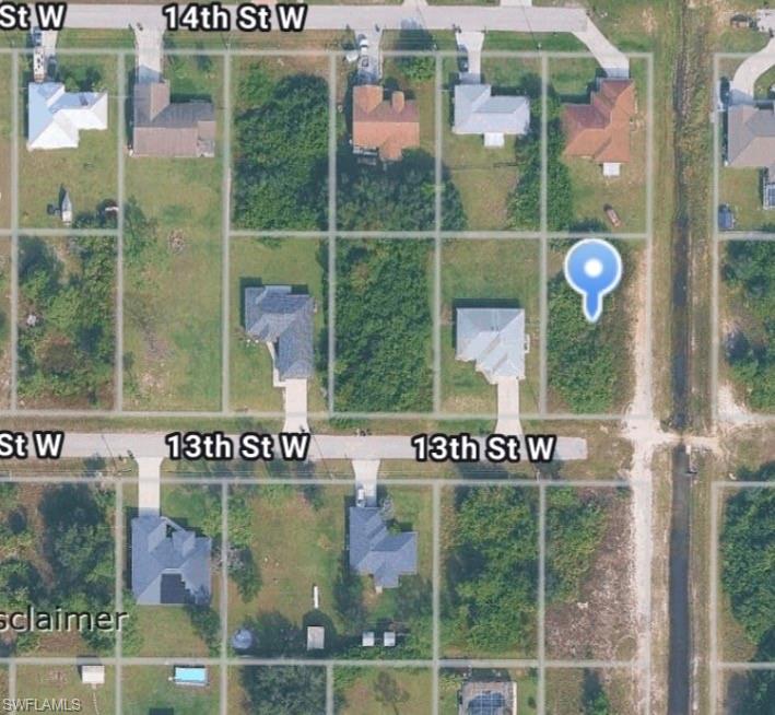 Corner lot next to canal in Lehigh Acres. Close to Lee Blvd. Amazing location and not much clearing required. Call today for more information.