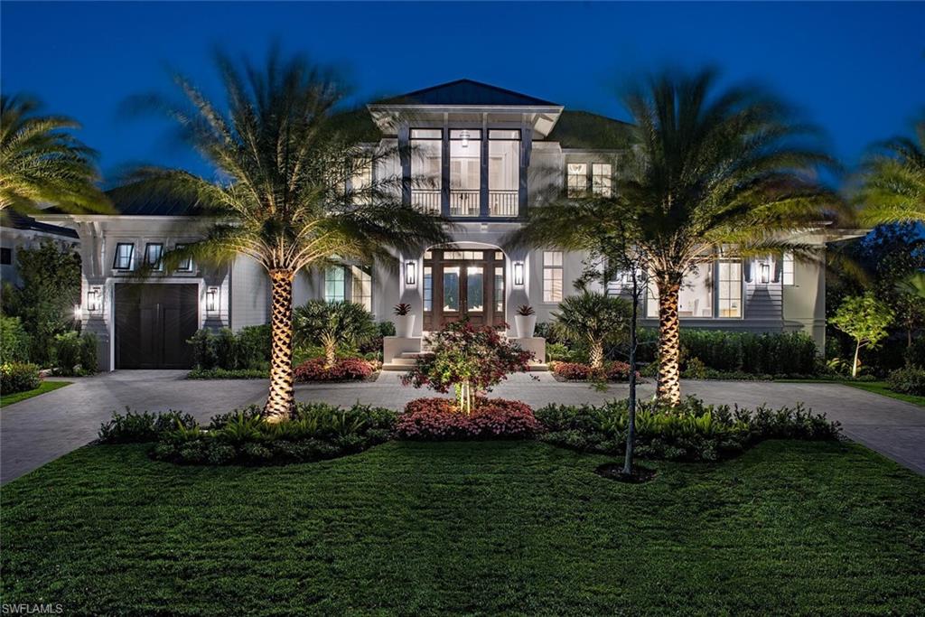 VIV Homes and MHK Architecture present an awe-inspiring new home situated on an oversized 100 X 185 parcel within easy walking distance to 3rd Street shops, dining, and Naples pristine white sand beach. Residence offers over 7,300 square feet of air conditioned living space including 5 bedrooms + study, 6 full and 2 half baths, 4 ½ car garage, upper lounge, VIP living, and an exercise room complete with custom glass wall. This very special opportunity includes full concrete construction, bespoke top end finishes, natural gas supply, and truly lacks nothing. Inside you will find Legno Bastone Lancaster wide plank wood flooring, Poliform Italian made closets, extensive natural stones, fireplace, gourmet kitchen, service kitchen, 2 laundries, elevator, Lutron HomeWorks system for privacy shades and lighting, security with cameras, Sonos sound, air conditioned garages, and more. The immense outdoor living area includes a 65’ pool, swim up bar, fire place, built in fire pit area and an oversized outdoor kitchen with island protected with automated roll down screens and shutters.