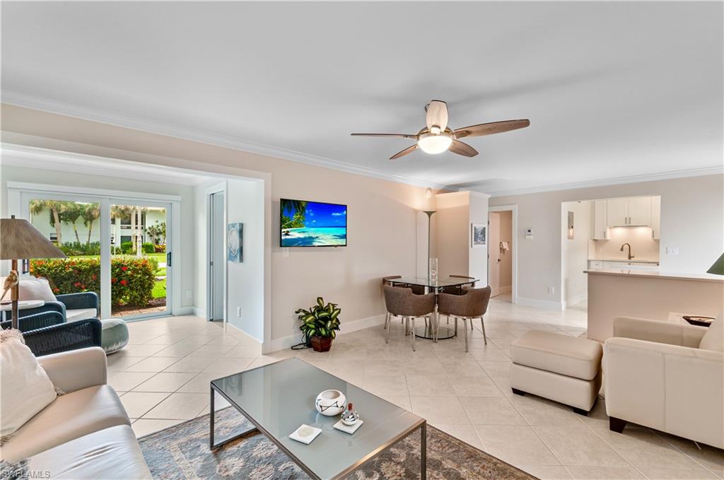 Extraordinary opportunity in the heart of downtown Naples!  Don't miss this beautifully renovated 2-bedroom, 2-full-bath condominium, offered fully furnished and ideally located in the heart of downtown Naples!  This move-in-ready residence features tile flooring throughout, impact resistant windows, and stunning tile work in both bathrooms.  The thoughtfully updated interior includes a completely renovated kitchen and bathrooms, blending modern style with comfort and functionality.  An outside storage unit is also included for additional convenience.  Enjoy the ultimate Naples lifestyle at an affordable price, just five blocks from the pristine white-sand beaches of the Gulf, and moments from world-class dining, shopping, entertainment, and all that downtown has to offer!