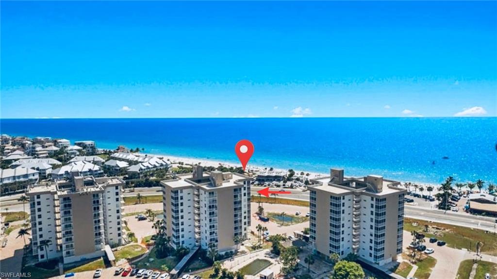 GULF & SUNSET VIEWS! Experience the ultimate Southwest Florida lifestyle from this beautifully positioned waterfront condo in the heart of Bonita Springs. Showcasing breathtaking panoramic views of the Gulf and unforgettable sunset skies, this coastal retreat offers a front-row seat to some of the area’s most spectacular scenery. Just steps from Bonita Beach, direct beach access across the street makes it easy to enjoy morning walks along the shoreline, afternoons in the sun, and evening sunset strolls. Inside, the residence features a bright, open-concept layout with seamless flooring throughout, creating a clean and cohesive living space. The updated bathroom adds a fresh, modern touch, while the inviting floor plan flows effortlessly to the screened lanai where the views take center stage. Residents enjoy a variety of sought-after amenities, including two resort-style swimming pools, planned tennis courts, and boat docks available for lease. Ideally located near shopping, dining, grocery stores, and popular local attractions, convenience is always within reach. Whether you’re seeking a personal beachside getaway, seasonal residence, or income-producing investment, this property delivers. With a proven rental history and loyal seasonal guests returning year after year, it offers exceptional rental potential and is remarkably easy to lease.  *Seasonal rentals are currently in place, making showing opportunities limited. Contact the listing agent for available showing dates and additional details. Don’t let the days on market fool you—this property has been actively occupied and generating rental income for much of the listing period.