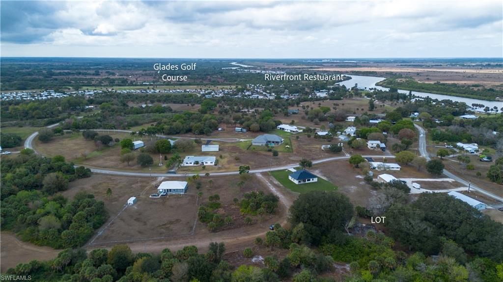 Located in the peaceful Indian Hills community of Moore Haven, this beautiful .84 acre residential lot offers the perfect blend of privacy, nature, and convenience. The property features mature oak trees, palms, and a natural canopy that creates a quiet, shaded setting ideal for a future homesite.Situated just minutes from the river, The Glades Golf Course, and the Riverfront Restaurant, this location provides a rural lifestyle while still offering easy access to local amenities. Indian Hills is a peaceful, no-HOA community with a country feel, making it an excellent choice for buyers seeking space, freedom, and a natural environment.

This generous .84 acre lot combines natural beauty with strong potential for future development—perfect for those looking to build or invest in a growing area of Glades County