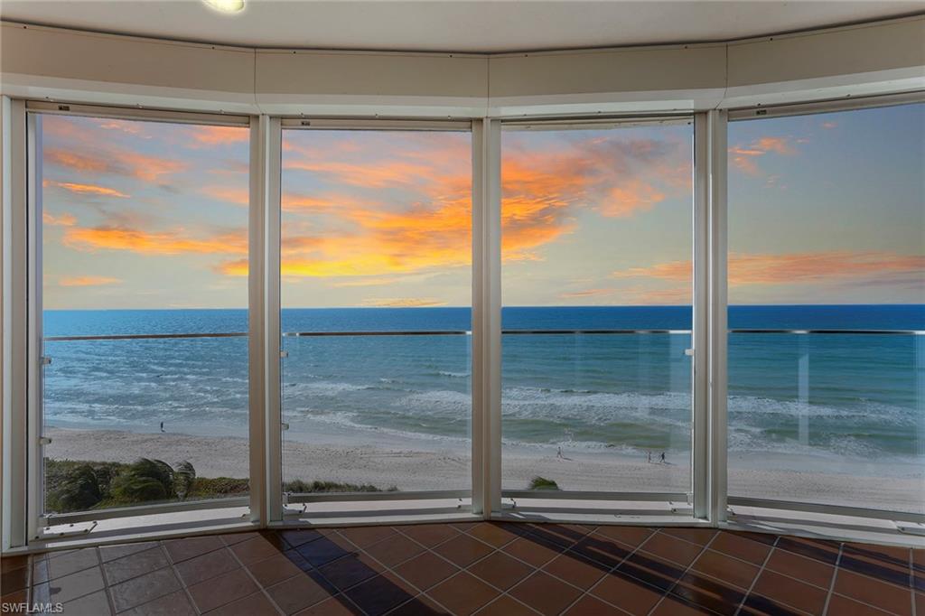 Unsurpassed, breathtaking views of the Gulf from the dramatic floor-to-ceiling windows of this palatial residence directly on the beach in the premier high-rise, Enclave at Park Shore. Enclave boasts only one estate per floor and 28 residences total with direct entry into your foyer from the elevator. This luxurious residence encompasses over 6,500 square feet and features a master suite with a sitting area and fireplace, three en-suite guest rooms, an inviting den with a fireplace, a formal dining area and a spacious kitchen with an eating area. An expansive great room, perfect for entertaining and enjoying unobstructed sunsets, leads to both an open balcony with an outdoor kitchen and an enclosed bonus living space. Every room has spectacular views of the Gulf, beach or bay. This residence includes a private two-car, air-conditioned garage plus an adjacent art studio or workshop. Enclave amenities include a pool, spa, grills, fitness room, tennis, guest suites, social room, gated entry and 24-hour security. The Park Shore beach promenade and nearby Venetian Village restaurants and shops make this residence the ultimate luxury estate.