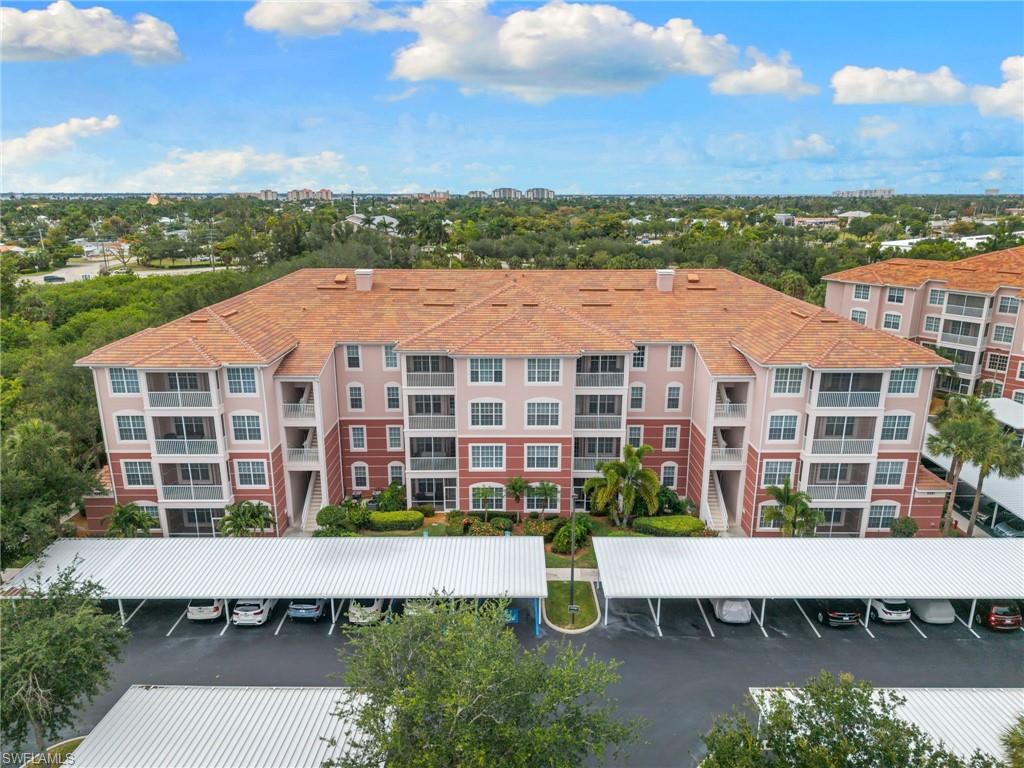Enjoy convenient first floor living in this very clean, well maintained three bedroom, two bath condominium in the desirable gated Majestic Palms community. No elevators are needed, offering easy access for residents and guests, as well as added convenience for pet owners.

This light filled residence features an open floor plan with high ceilings, large windows and abundant natural Florida sunshine. Neutral finishes, contemporary flooring and coastal inspired décor create a bright and inviting atmosphere throughout. The spacious kitchen offers extensive cabinetry, a breakfast bar and ample workspace for everyday living and entertaining.

The primary suite includes an oversized walk in closet and en suite bath. Two additional bedrooms feature large windows that provide excellent natural light. An in residence laundry area adds convenience.

Step onto the screened lanai to enjoy peaceful views of the private landscaped green space accented by colorful hibiscus and mature tropical plantings. A dedicated covered parking space is included, and the community pool is just a short walk away.

Majestic Palms offers resort style amenities, including a lakeside pool and spa, sundeck, barbecue area, fitness center, clubhouse, business center and coffee bar. Sidewalks throughout the community provide the perfect setting for an evening stroll, walking the dog or enjoying Southwest Florida's natural beauty.

Ideally located in the sought after Iona area of Fort Myers, residents enjoy convenient access to shopping, dining, entertainment and recreation. Situated between the vibrant River District of downtown Fort Myers and the Gulf beaches of Sanibel, Captiva and Fort Myers Beach, this location also offers easy access to U.S. 41 and Southwest Florida International Airport.

Whether you are seeking a full time residence, seasonal retreat or investment opportunity, this home offers exceptional flexibility. The community allows up to four leases annually with a 30 day minimum rental period. Being sold furnished, this move in ready residence offers an exceptional opportunity to begin enjoying the Southwest Florida lifestyle immediately. According to the seller, the property has not experienced flooding. A wonderful opportunity to enjoy low maintenance living in a well maintained community.