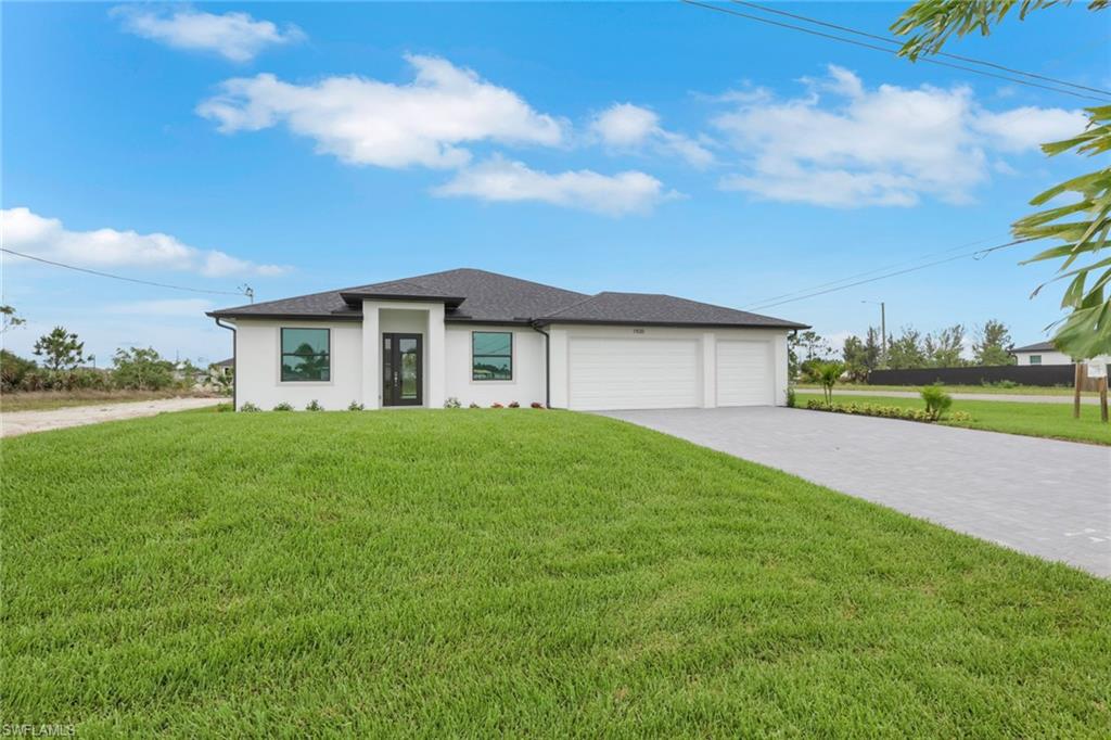 Welcome home! This stunning Hardwyn Signature model on a FRESHWATER canal, an award-winning design, is now COMPLETED! This beautiful pool home offers 4 spacious bedrooms, 2 full baths, and a 3-car garage. Enjoy peace of mind with PGT hurricane-impact windows and doors—no shutters needed! Inside, you’ll find stylish tile flooring throughout, cozy carpet in the bedrooms, elegant tray ceilings, soft-close cabinetry, sleek quartz countertops, and stainless-steel appliances. The 8 ft doors add a touch of grandeur to every room. The master suite is a true retreat, featuring a tray ceiling, an oversized walk-in closet, dual sinks, and a luxurious separate tub and shower. Step outside to your private oasis: a 12x24 pool with an expansive 18x45 paver deck, perfect for relaxing or entertaining. Spacious yard for kids and pets to roam! Plus, the garage boasts a durable epoxied floor with stylish flakes. This home comes with a 1-year builder warranty and is located in Flood Zone X, so no flood insurance is required. Inquire for more details! No assessments due.