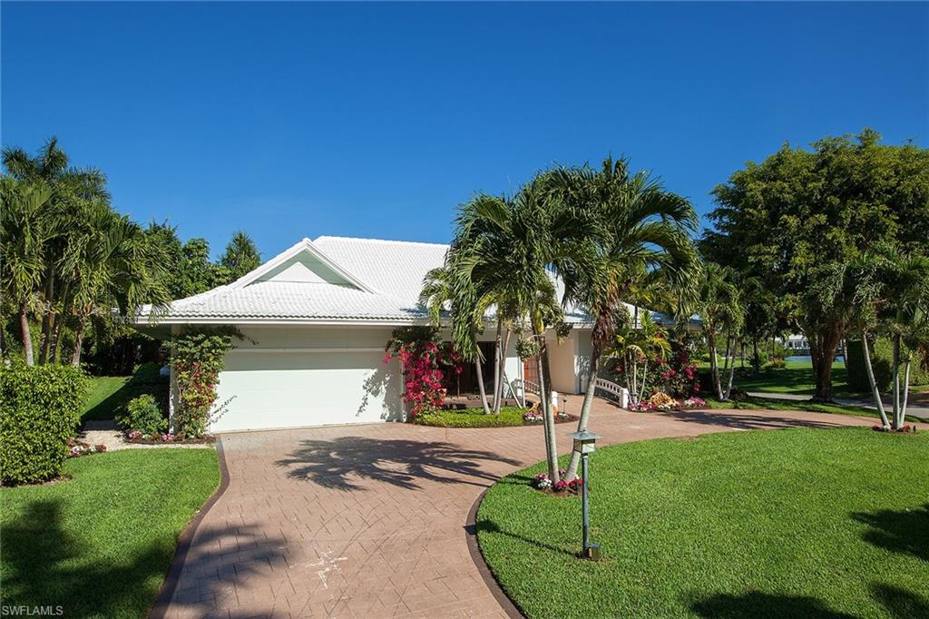 Sabre Cay is a highly sought-after exclusive enclave of 15 homes in Port Royal located just off of Gordon Drive. This oversized property offers western exposure and a private dock in the Sabre Cay boat basin. Beautiful views, Port Royal Club eligibility, Direct deep water boat access this is the ideal location to build your dream home. Currently, the home is occupied with tenants (please do not disturb occupants.) This sale includes PID # for deed boat dock. Although the current home is very livable, this offering is for land and boat dock value.