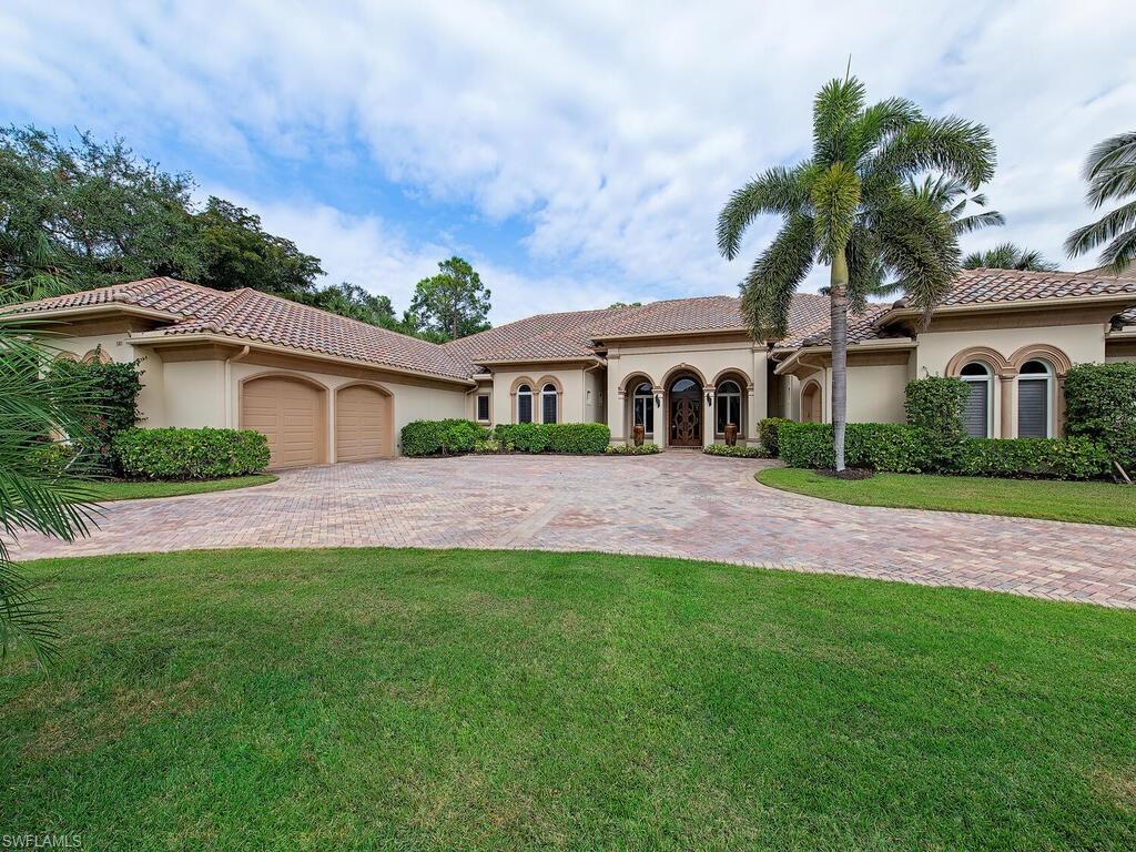 H8481 - This classic style home is as PERFECT as the day it was built in 2010 by BCB Homes. From the circular drive & stunning front door you’re welcomed into a one-story plan that offers 4 bedrooms, 4 ½ baths & two separate his & her offices. 3 split en suite guest bedrooms offer privacy from the spacious primary suite. The gourmet kitchen features wood cabinetry, built-in appliances & expansive granite countertops. Of note: both AC units replaced in 2022, impact glass doors & windows throughout, cypress wood ceilings & Jerusalem stone floors on the lanai & front porch, 3 AC garages w/epoxy floors & built-in cabinetry. Massive 1,700’ lanai includes a stone gas fireplace, outdoor kitchen w/36” Viking grill & Uline refrigerator & an oversized pool, spa, sun-shelf & water feature. The .64 acre lot has a golf course & long water view. Spectacular Grey Oaks has 2 clubhouses, a 30,000’ wellness center, 450 seat Pool Café, 54 holes of championship golf, 10 tennis, 10 pickleball & 4 bocce courts & a very convenient location.