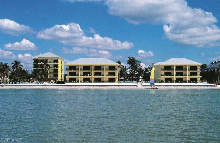 DIRECT GULF-FRONT UNIT! Income Maker facing the Beach & Gulf!  Quality Resort Condo Hotel. Low rise unit in high demand! This 2nd-floor studio unit has a Million Dollar View!  Tropical ‘British West Indies’ décor & furnishings, New kitchen granite counter tops and white cabinetry, two queen beds, and a sleeper sofa. Excellent mid-island location with many resort amenities that include two heated pools, BBQ grills, secluded seating areas in the sun and shade, shuffleboard, volleyball, chairs/beach towels, coffee and snack bar, and water sports rentals on-site! Ideal vacation getaway and a great rental income producer. Carefree easy ownership. Owners are allowed 56 days per  for personal use, and the rest of the time it's on the resort hotel rental program, over $30,000 in last year in owner's rental income. Your Island Paradise Awaits!