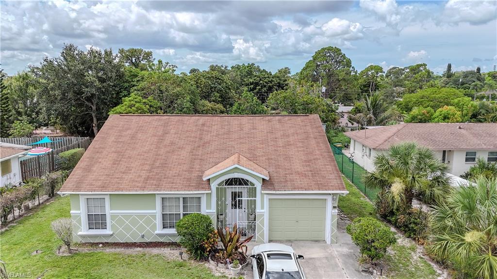 Welcome to this beautifully maintained 4-bedroom, 2-bath home situated on a spacious 0.27-acre lot in a highly desirable location! Offering the perfect combination of comfort, convenience, and outdoor living, this property is ideal for families, first-time buyers, or anyone looking to enjoy the Florida lifestyle.

Inside, you'll find a functional and inviting layout with plenty of space to entertain or simply relax. Major updates provide added peace of mind, including a newer roof (2017) and A/C system (2018). A new fence installed in 2025 along one side of the property enhances privacy while complementing the expansive backyard.

Step outside and enjoy your own tropical oasis featuring mature mango, papaya, and banana trees, creating the perfect setting for outdoor gatherings or peaceful evenings at home. Best of all, the home is located in a NO FLOOD ZONE, offering added value and potential savings on insurance.

Conveniently located just minutes from shopping, dining, schools, parks, and everyday essentials, this home combines a prime location with exceptional value. Furniture is negotiable, making this a fantastic opportunity for buyers looking for a move-in-ready option.

Don't miss your chance to own this well-cared-for property that offers space, updates, and an unbeatable location. Schedule your private showing today!