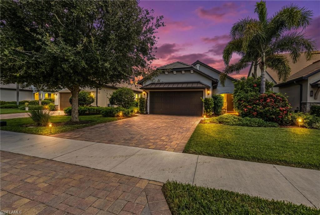 Welcome to Corkscrew Shores, one of Estero's most sought-after resort-style communities, ideally situated between Naples and Fort Myers. This beautifully maintained 3-bedroom, 2-bath pool home offers 1,433 sq ft of bright, open living space with a seamless great room layout connecting the living, dining, and kitchen areas, perfect for entertaining and everyday comfort. The kitchen features an island, pantry, and full appliance package. The private pool and screened enclosure extend your living space outdoors.
Life in Corkscrew Shores centers around a spectacular 240-acre spring-fed lake ideal for kayaking, paddleboarding, fishing, and electric boating, complemented by an amenity-rich community offering a stunning Grand Clubhouse, zero-edge resort-style pool with spa, indoor/outdoor restaurant and full-service bar, and fire pits for evening gatherings. Additional amenities include a fitness center, Har-Tru tennis courts, pickleball courts, bocce ball courts, and a catering kitchen. No CDD fees and low HOA make this an exceptional value. One-year ownership required prior to leasing. Conveniently close to Gulf beaches, top-rated schools, dining, and premier shopping.