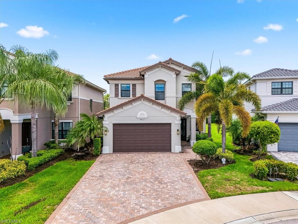 Welcome to a home that perfectly blends luxury, comfort, and the vibrant Naples lifestyle. Located in the sought-after community of Stonecreek, 4432 Aurora Street is designed for those who love to entertain, unwind, and enjoy every moment at home. Step inside to discover a stunning designer-inspired interior where crisp white cabinetry, elegant finishes, and rich wood flooring create a sophisticated yet inviting atmosphere. The chef's kitchen serves as the heart of the home, featuring premium stainless-steel appliances, abundant cabinetry, and a seamless flow into the main living and dining spaces, ideal for everything from casual family dinners to memorable gatherings with friends. The dining room makes a statement with its striking accent wall and modern lighting, while the climate-controlled wine room offers the perfect space to showcase and enjoy an impressive collection. Whether hosting a wine tasting or celebrating special occasions, this home was built with entertaining in mind. Outside, your private backyard oasis awaits. Enjoy sunny Southwest Florida days lounging by the resort-style pool and spa, surrounded by lush tropical landscaping and turf grass for easy maintenance. The covered lanai provides the perfect setting for morning coffee, weekend barbecues, or relaxing evenings overlooking the sparkling pool and spa. Beyond the home, Stonecreek offers an exceptional lifestyle with world-class amenities including a resort-style pool, lap pool, fitness center, tennis courts, pickleball, basketball courts, playground, and a vibrant social calendar. Conveniently located near Naples' finest dining, shopping, golf courses, and Gulf beaches, this residence offers the perfect balance of luxury living and everyday convenience.