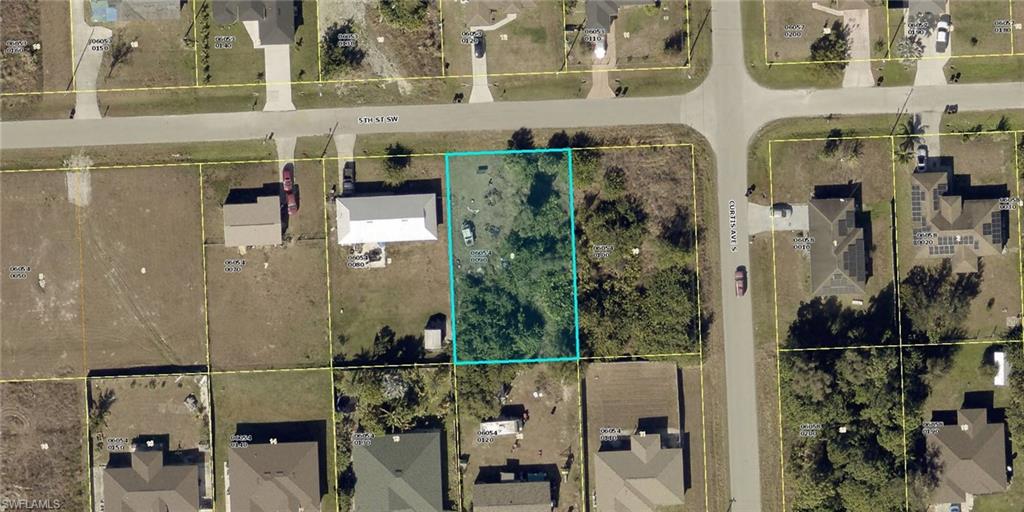 Welcome to this prime lot in the rapidly growing community of SW Lehigh Acres! Perfectly positioned for your dream home, this spacious lot offers endless possibilities for custom construction. Providing easy access and extra privacy. Surrounded by new developments and with close proximity to schools, shopping, and parks, this is an ideal spot to invest in your future. Don’t miss out on the opportunity to build in a vibrant area that’s on the rise!