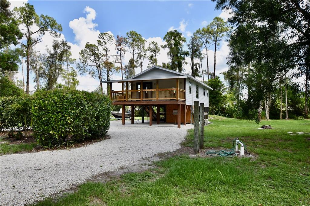 Welcome to your own private slice of paradise! This beautifully remodeled 2-bedroom, 2-bath home sits on 1.25 fully fenced acres, offering the perfect combination of country living and modern convenience. The home features new flooring, fresh interior paint, upgraded cabinetry, stylish backsplash, new appliances, updated lighting, and ceiling fans throughout. Additional improvements include a newer roof, new well, septic system, and water treatment equipment for added peace of mind.

Enjoy the screened-in hot tub and outdoor entertainment area, perfect for relaxing or hosting friends and family. The spacious property offers two dedicated RV parking spaces, plenty of room for your boat, trailers, and other recreational vehicles, plus ample space for pets to roam.

Conveniently located just 10 minutes from I-75 and only 20 minutes from Naples' beautiful beaches, shopping, dining, and entertainment. Experience the charm of tiny home living with the luxury of a large, private lot.

Available for annual rental.