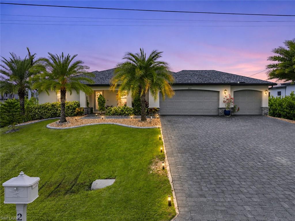 Welcome to 2829 SW 25th Ave, an exceptional opportunity to own in one of the most desirable areas of Cape Coral. Surrounded by beautiful homes with properties listed and sold for over $1 million, this ideally located residence offers the perfect combination of location, space, and lifestyle. This spacious split-level home features 4 bedrooms and 2 bathrooms with a functional layout designed for comfortable living, entertaining, and hosting family or guests. Situated on an oversized corner lot, the property offers added privacy, generous outdoor space, and standout curb appeal with plenty of room to enjoy the Florida lifestyle. Centrally located, you’re just minutes from area beaches, surrounding islands, marinas, and some of Southwest Florida’s most sought-after waterfront destinations. Enjoy convenient access to a wide variety of restaurants, shopping, entertainment, and healthcare facilities all nearby. Whether you’re looking for a full-time residence, seasonal getaway, or investment opportunity in one of Cape Coral’s premier neighborhoods, this home offers exceptional value, location, and endless potential. Priced to sell—this opportunity won’t last!