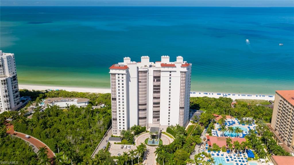 C.18138 - Rare high floor 5-Star Beachfront Remington largest “03” Tower JEWEL located on the perfect floor, touting an envious location, tucked smack-dab between The Naples Beachfront Ritz Carlton directly North and the Bay Colony Beach Club and Tennis Club directly South and East. It’s overdue time to play, right? From the moment you step from your private elevator into this rare JEWEL, your soul recognizes you’ve come home. This Gem’s beautifully appointed interior spaces and places artfully blend seamlessly with the generous outdoor westerly sunset Gulf front lanai offering mesmerizing, unobstructed, panoramic, tranquil, turquoise Gulf views where dolphins and manatees play, plus an equally generous easterly sunrise lanai, perfect for morning coffee. Dig your toes into Naples’ sugar white sandy beach, just steps away from your Gulf front pool, encouraging long daily sunrise or sunset strolls, or a blissful Gulf dip. Don’t forget to be pampered by the exceptional World Class Concierge services, along with the included lengthy menu of Bay Colony and Pelican Bay membership privileges.