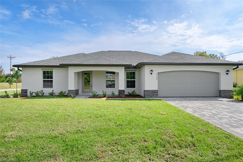 New construction! Come see our "St. Augustine" floor plan. Beautiful 4 bedroom home. Home includes a 10 year structural warranty and a 1 yr warranty! Open floor plan with cathedral ceilings and center island kitchen. Spacious living room leads to large covered lanai to enjoy the SW Florida lifestyle! Features Include: Concrete Block Construction and Wood Frame Interior, Under Truss Lanai, Lenox 14 Seer high efficiency AC system, Moen plumbing fixtures, Dimensional Shingles, PGT Low E Insulated windows, 36” upper cabinets with soft close doors, Granite Counters in Kitchen and Bathrooms, Stainless Steel Kitchen appliance package, colonial style raised panel doors, Electric garage door opener, 18" tile flooring in main living areas , Stone Accents on front elevation of the home, irrigation system, epoxy coated garage floors. Pictures shown are of a completed home and features may differ. You will not find another new construction home at this price with this quality of construction!