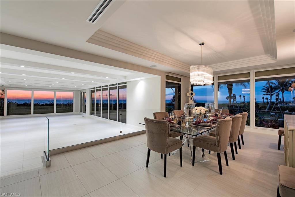 Stunning direct Gulf & coastal views … true "Beach House" feel and functionality with your own landscaped grand open air terrace that has over 1,700 square feet of tropical outdoor living overlooking the Gulf of Mexico as well as SW FL coastline plus THREE of your own private walkout accesses for direct beach access and strolls along the promenade!! Premier location right up on the beach plus Venetian Village shops and restaurants across the boulevard. An authentic re-mastering … expansive Gulf views from ALL rooms, new floor to ceiling hurricane glass and zero reveal roll-down shutters, motorized phantom screens for dramatic and alluring oversized direct Gulf facing “picture frame” opening so you can enjoy the tradewinds not to mention those stunning sunsets too, Sonos sound, Wolfe / Subzero appliances,  Lutron lighting, new wide oak plank and Italy sourced hard surfaces for flooring, no detail overlooked … all elements replaced including cabinets, lighting, fixtures, air conditioning equipment and duct work, surfaces, flooring, glass / windows. Start life on the beach now. Live life incomparably every time you come home. Enjoy posted video tour!