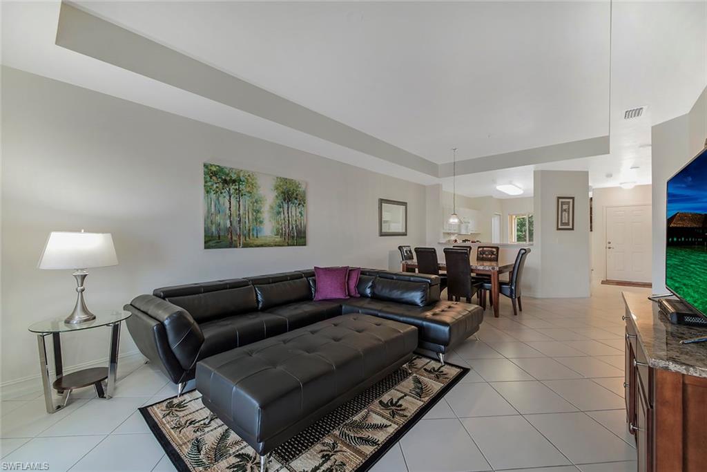 c.13067 -Peaceful setting, overlooking lake and fountain, close to Naples downtown and beaches.  3rd floor views, elevator building, 2 bedroom 2 bathroom tiled condo shows nicely. Recently repainted, new carpet in the bedrooms and new furnishings throughout!  Blue Heron is a gated community with a clubhouse and community pool.  Convenient location near Radio Road and Davis Boulevard, easy access to all of Naples attractions as well as the  PUBLIX and stores at Berkshire Commons. This community has a 30 day minimum rental policy which is very flexible for investors.