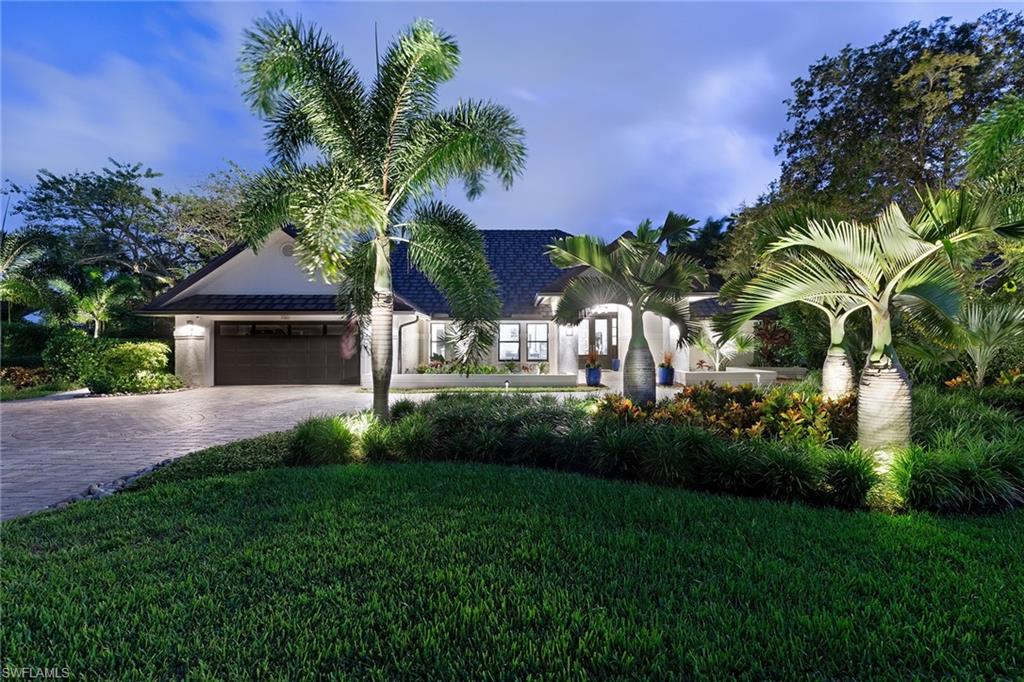 Meticulously remodeled home located in one of Naples' most coveted communities, Pelican Bay. A magnificent renovation that's as inviting as it is breathtaking, with its resort-like, Florida-style coastal elegance. Covered lanai with outdoor kitchen overlooking a heated saltwater pool with hot tub, sundeck, floating sundeck, dual waterfalls and a fire feature. True chef's kitchen features a 12' island and 48" gas cooktop. Open flow living room with custom vaulted ceiling detail, office/den with built-in Murphy bed, fireplaced family room with wet bar, all with Legno Bastone wide-board flooring, Sonos and cinema sound speakers, Lutron lighting, camera security system and central vac. Situated on a corner lot in Oakmont with professional landscaping, lighting and gracious curb appeal. Minutes from beach tram, Artis—Naples, Waterside Shops and Mercato. Pelican Bay offers two private beach clubs with 3 miles of beach, oceanside dining, complimentary chairs, umbrellas, kayaking, canoeing, sailing and community center with full fitness center, spa and tennis facilities. Club Pelican Bay offers a newly constructed clubhouse with 27 holes of golf, separate membership required.