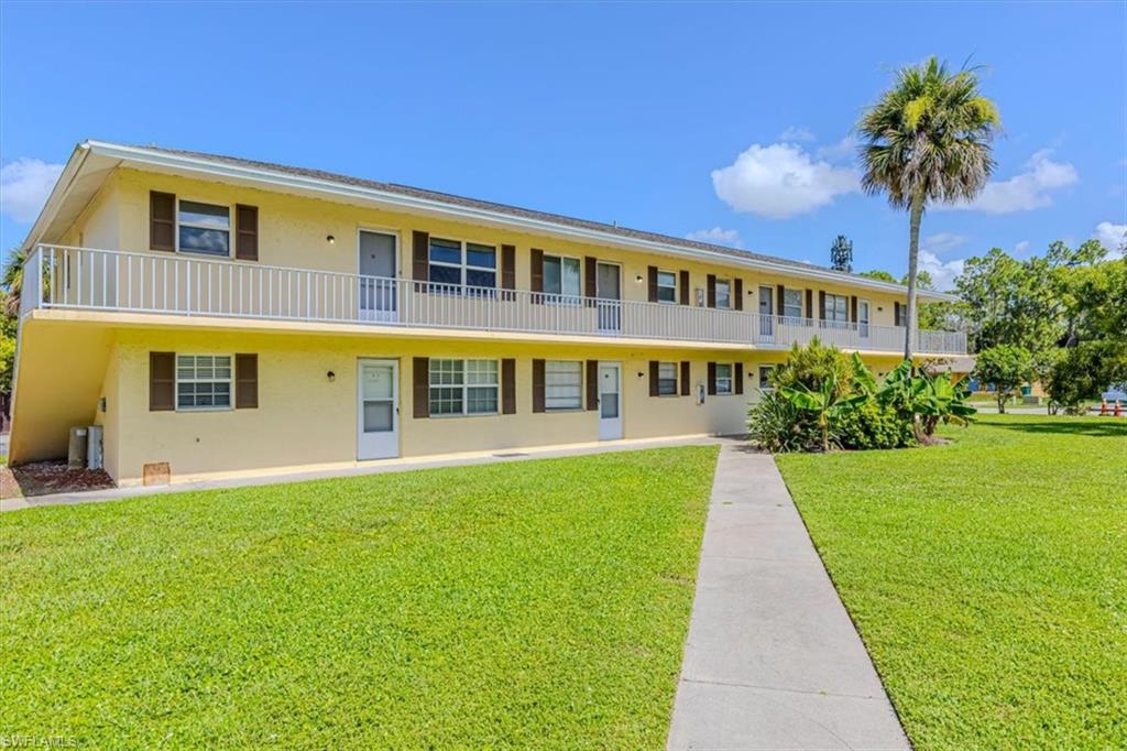 Corner end unit with abundant natural light and situated in the heart of Naples! This beautifully updated 2-bedroom, 1-bath condominium is the largest size variation offered in the condo complex and offers exceptional value in one of Southwest Florida's most desirable locations. Directly across from the prestigious Grey Oaks community, you'll be just minutes from world-class shopping, dining, championship golf, and the stunning Gulf beaches that make Naples such a sought-after destination. Inside, you'll find a recently remodeled kitchen that opens to the living area, creating a bright, spacious, open-concept floor plan perfect for everyday living and entertaining. The interior has been freshly painted, and new carpet has been installed in both bedrooms, making this home truly move-in ready. Whether you're searching for a full-time residence, seasonal getaway, or investment property, this condo checks all the boxes. Residents enjoy access to a community pool, clubhouse, and on-site laundry facilities within a well-maintained community. The condo also has a unconditioned dedicated storage unit that is lockable and a great space for beach chairs, etc. A special assessment is currently in place for the complex. Beautifully maintained and easy to show, don't miss this opportunity to own in a prime Naples location!