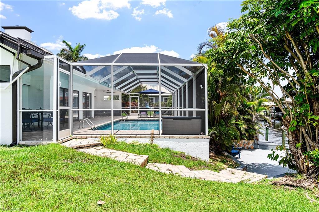 This is a VACATION RENTAL only. Owners will not consider annual rentals. Weekly rentals are welcome.
Villa Linda is a 3-bedroom, 2-bathroom property with direct gulf access (2 minutes/.2 miles by boat) and a solar-heated pool. This home will sleep a maximum of 6 guests (including children) and is not pet friendly. 

· · · · · PROPERTY PERKS · · · · ·
- Bicycles
- Fireplace
- Boat lift

· · · · · LOCATION · · · · ·
- Located in Southeast Cape Coral
- Close to Horton Park & Boat Ramp
- Close to Four Mile Cove Ecological Preserve
- Close to Del Prado Blvd. with plenty of shopping, restaurants & bars

· · · · · LIVING AREAS · · · · ·
- Flat-screen TV
- Comfortable seating
- Fireplace

· · · · · KITCHEN & DINING · · · · ·
- Fully equipped
- Dining area with seating for 6

· · · · · BEDROOMS · · · · ·
- Primary Bedroom: King bed, sliders to the pool & flat-screen TV
- 2 Guest Bedrooms: Queen beds & flat-screen TVs in each, one has sliders to the pool

· · · · · BATHROOMS · · · · ·
- Primary Bathroom: Walk-in shower & double-sink vanity
- Guest Bathroom: Shower/tub combo & doubles as the pool bathroom

· · · · · OUTDOOR LIVING · · · · ·
- Solar heated pool
- Southern pool exposure
- Dining area with seating for 6
- Sun loungers
- Grill
- Boat dock seating
- Boat lift

· · · · · THIS HOUSE IS GREAT FOR · · · · ·
Boaters who are looking for quick access to the open water
