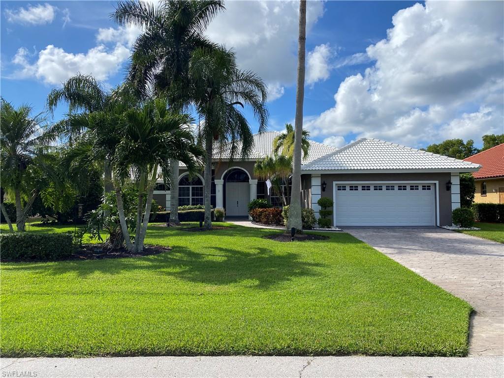 Hidden in Beachy Bonita Springs is the community of Spanish Wells and this beautiful SF home that features, exceptionally well kept 4 bed, 4 bath, 2 car garage home with an amazing outdoor pool, spa & private lanai living. Open spacious living area has exceptional southern views and is great for entertaining with the large open concept kitchen bar! The master bedroom and en suite bathroom are very spacious with his & her vanities along with a large walk-in closet and dedicated central air.  The other end of the house has two more bedrooms each with their own en suite full bathrooms. The 4th bedroom, has a built-in queen size Murphy Bed. Some Recent upgrades include a new reroof 2019 transferable warranty, Impact rated garage door in 2019, Clear hurricane shutters for every window in the house. Stainless Steel washer, dryer, fridge and built-in gas grill all new 2019, new pool heater/pump in 2017. 24hr Gated guard house, low HOA fees = great value. Golf, Fitness and Social memberships available but not required. A variety of amenities: 27-Hole Golf Course, 32K sq.ft. Clubhouse, 5 Tennis Courts, 5 Bocce Courts, Fitness Center, Dining, Relaxing Tropical Pool, Pro Shop and more.