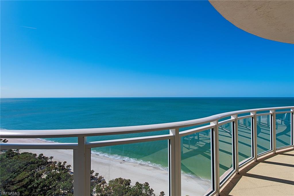 Welcome to the pinnacle of coastal luxury. This rarely available penthouse atop The Brighton at Bay Colony offers more than 6,100 square feet of refined living with panoramic Gulf views stretching from Park Shore to Sanibel Island. Accessed by a private, secured elevator, this top-floor sanctuary seamlessly blends elegance, comfort and security. Inside, you’ll find four spacious bedrooms, a den, four full baths and two half baths, designed to accommodate grand entertaining and private relaxation. Rich teak floors run throughout the expansive living spaces, setting the tone for the sleek, chef-inspired kitchen outfitted with premium German appliances and stainless-steel finishes. Enjoy effortless living with abundant storage, dual washers and dryers, electric sunshades, hurricane-rated windows, and full storm protection via electric shutters. Go out onto your private rooftop terrace with all new decking, an outdoor retreat, featuring a summer kitchen, private spa and half bath, ideal for sunset cocktails or starlit soirees. This residence also includes two dedicated parking spaces and a private poolside cabana for those wonderful Naples days. The building itself has recently completed a sophisticated lobby renovation and amenity upgrades to include a completely remastered lobby, social room with catering kitchen, fitness center, updated elevators and a new roof. The front entrance and pool deck refurbishment underway is scheduled for completion by April 2026, all fully paid for by the owner. All that’s left for you to do is move in and enjoy the height of coastal living.